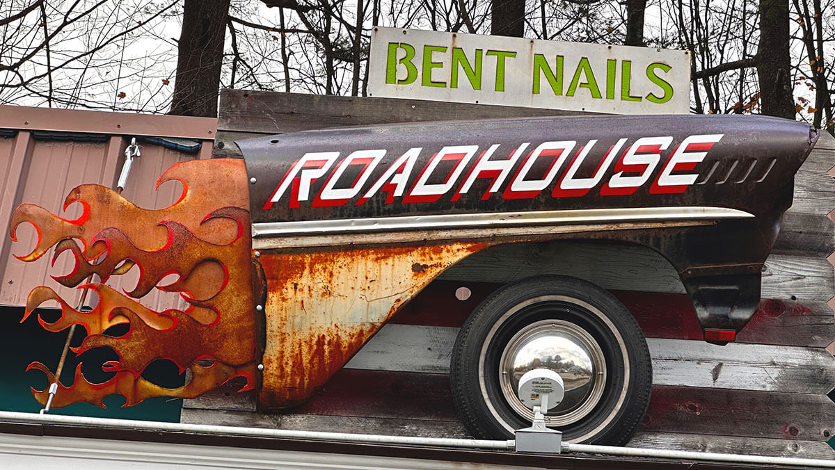 Bent Nails Roadhouse sign, a car fender with flames