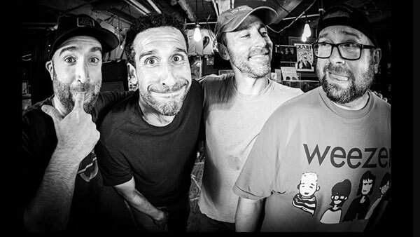The four band members of Interwoods